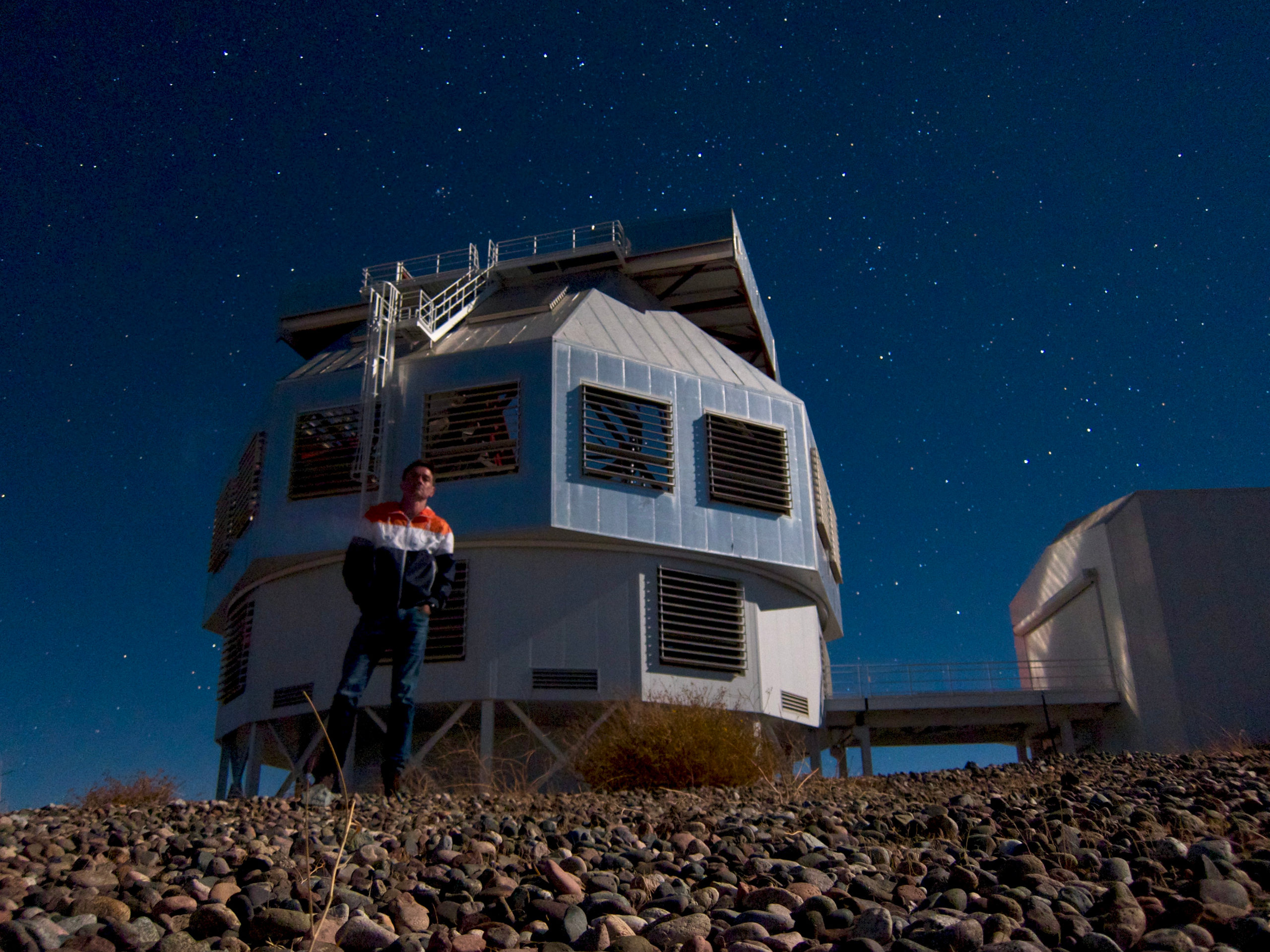 picture of stop sign featuring icons of people looking at their smartphones