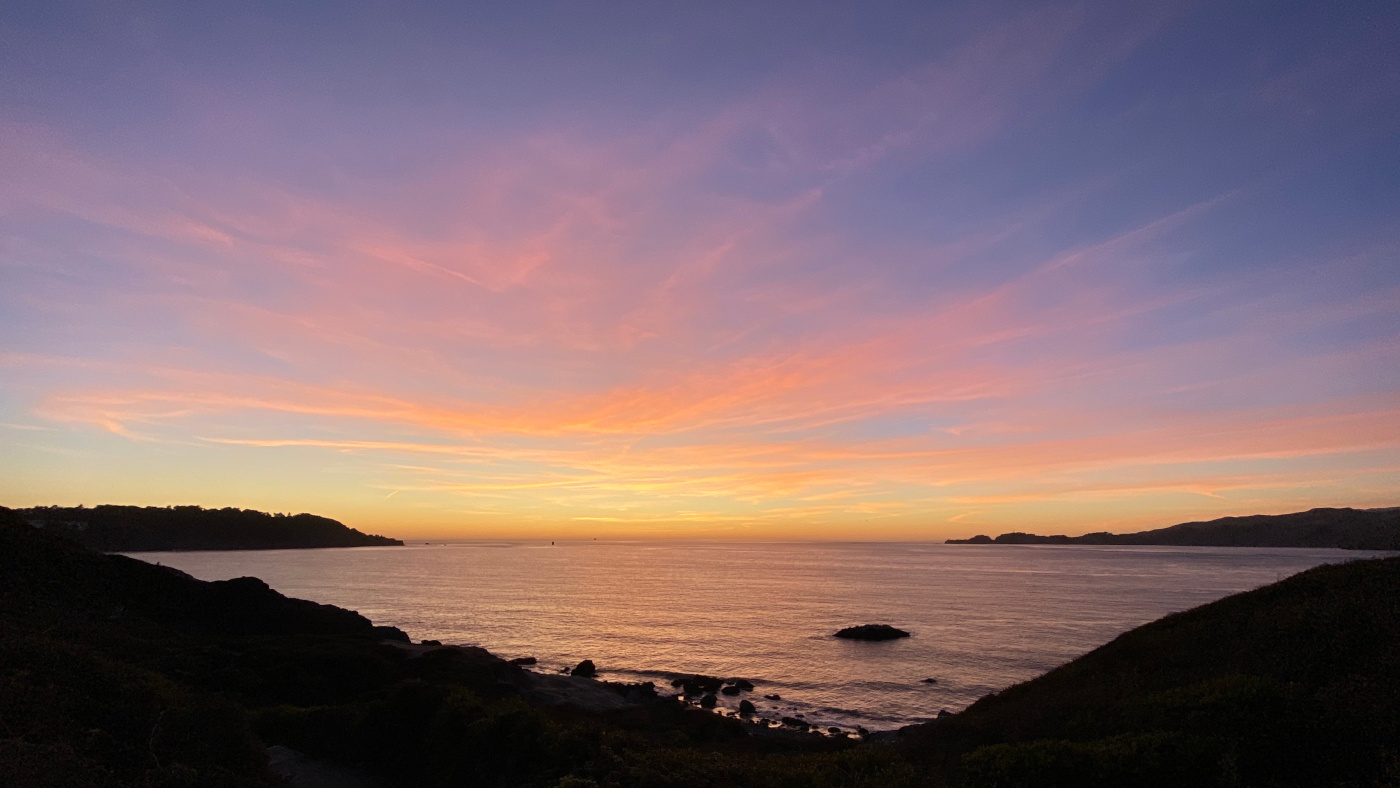 picture of a sunset reflecting on the Golden Gate water passage